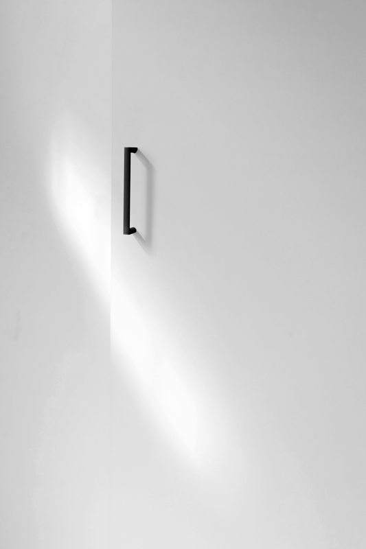 White door with black handle